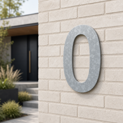 Individuelle Hausnummer 0 in Coolvetica - John Steel