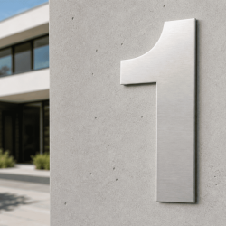 Individuelle Hausnummer 1 in Coolvetica - John Steel